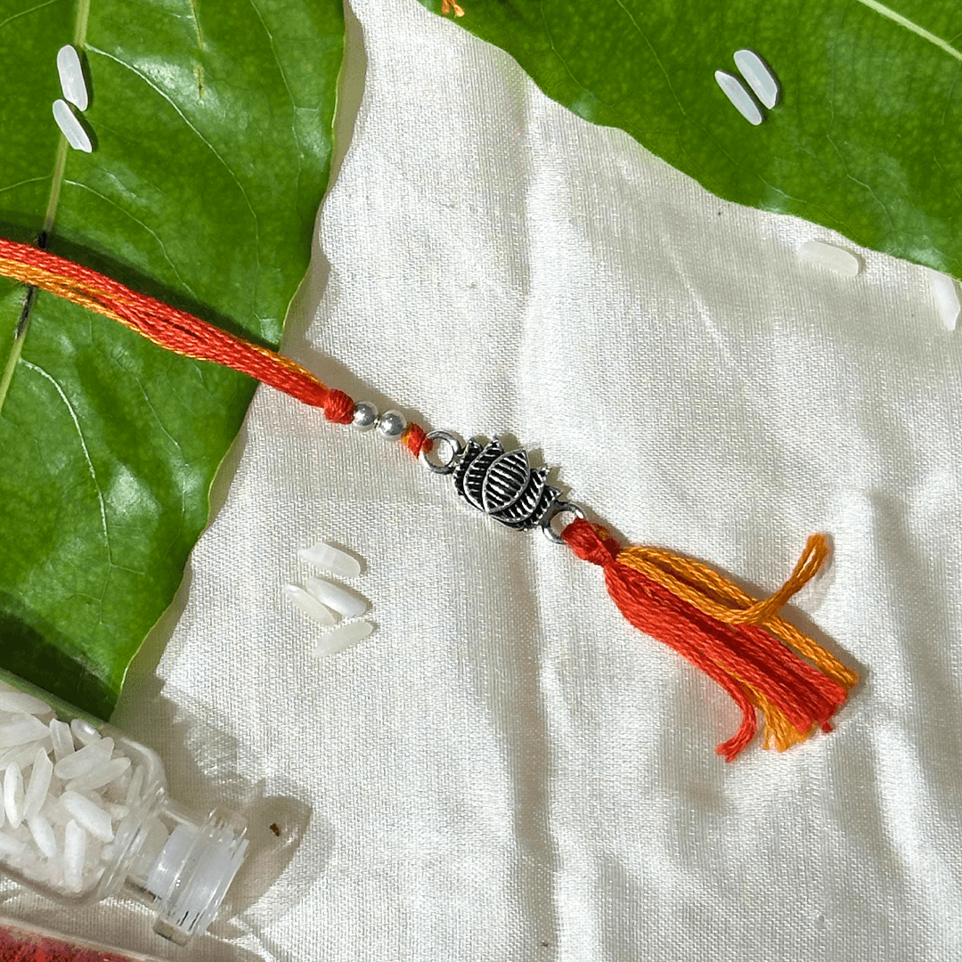 Silver Intricate Lotus Lumba Rakhi