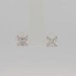 Load and play video in Gallery viewer, Glistening Silver stud earrings
