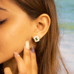 Load image into Gallery viewer, urban-mother-of-pearl-silver-stud-earrings-gold
