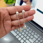 Load and play video in Gallery viewer, Contemporary Pearl Drop Earrings
